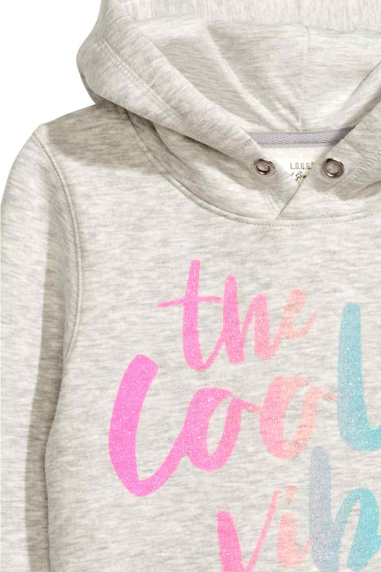 Hooded top with a text motif